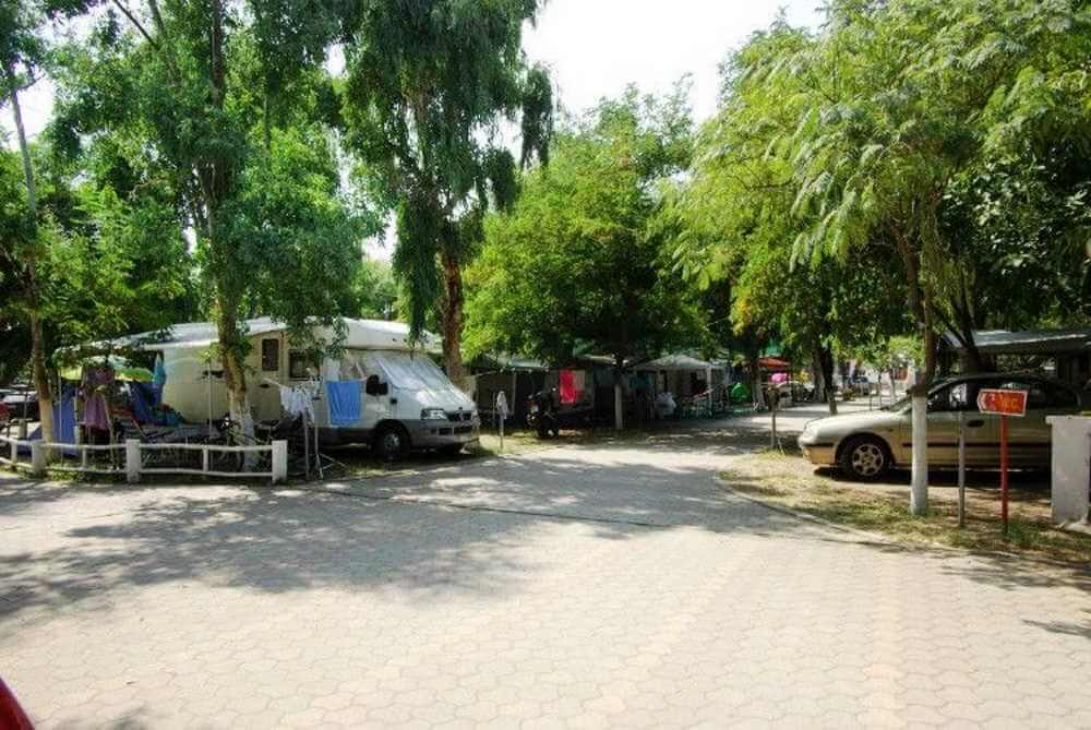 Camping with rooms by the beach. Family vacation in campsite.Camping Ιza