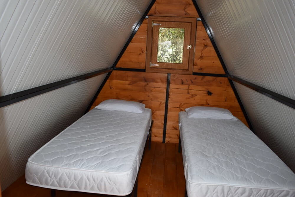 glamping greece Camping with rooms by the beach. Family vacation in campsite.