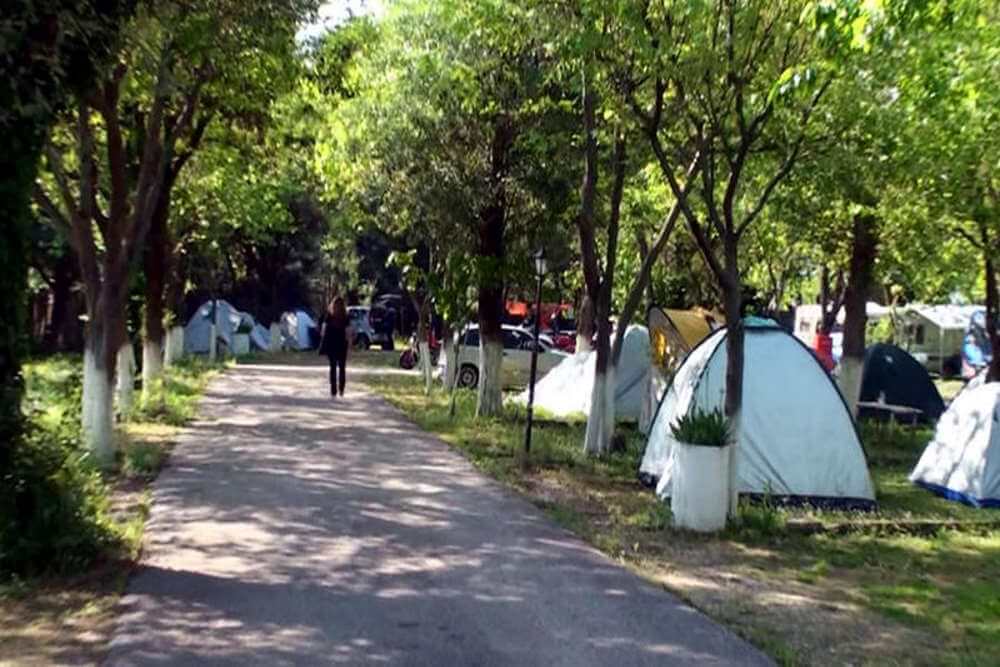 Camping with rooms by the beach. Family vacation in campsite.Camping Meteora